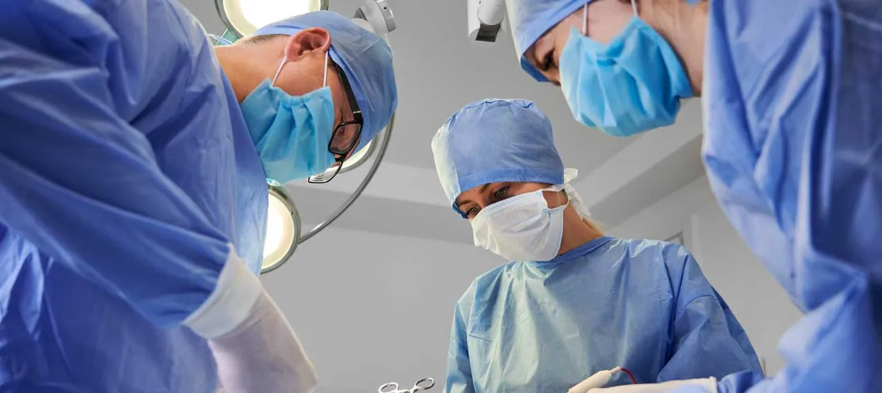 Decorative only image - surgeons performing a procedure